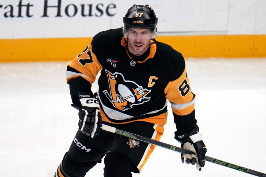 crosby-reaches-1,700-points-as-penguins-beat-blues