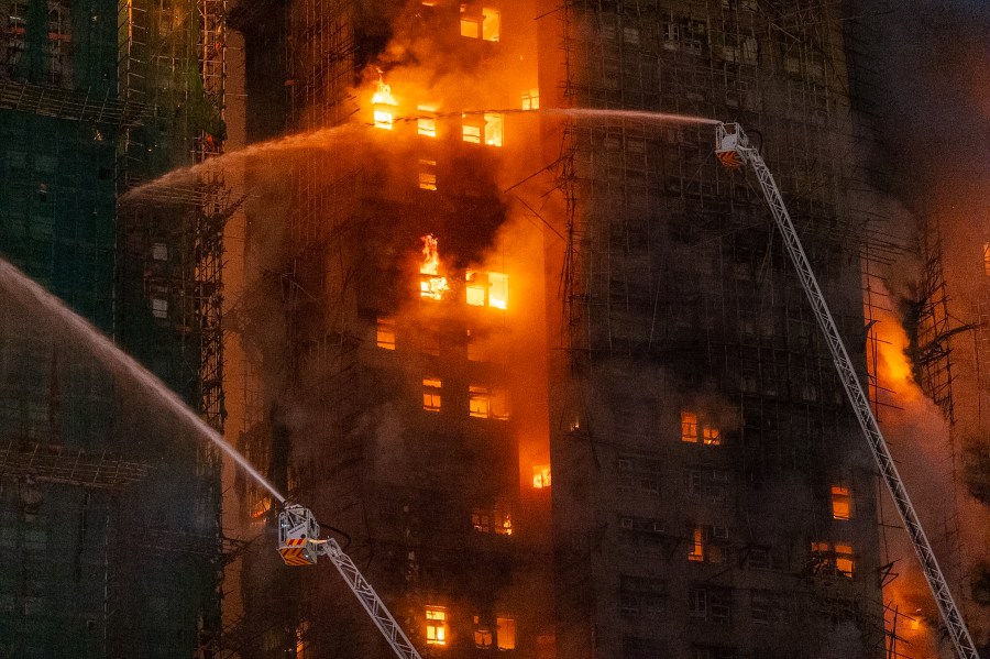 3-arrested-in-hong-kong,-as-a-high-rise-fire-leaves-at-least-44-dead-and-279-reported-missing