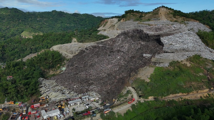 mound-of-garbage-collapses-at-philippine-landfill,-killing-2-and-leaving-36-others-missing
