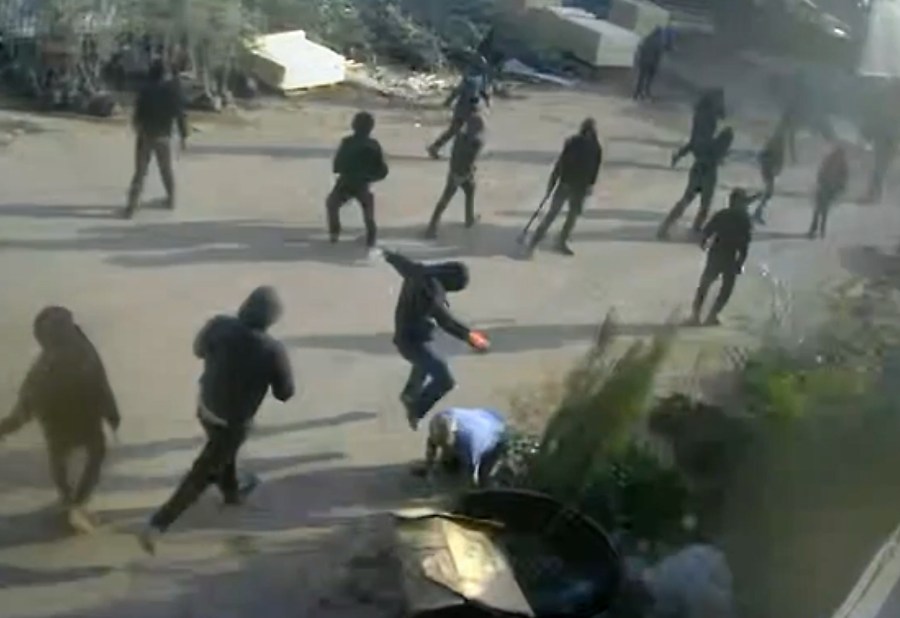 video-shows-masked,-armed-men-beating-a-palestinian-in-the-occupied-west-bank