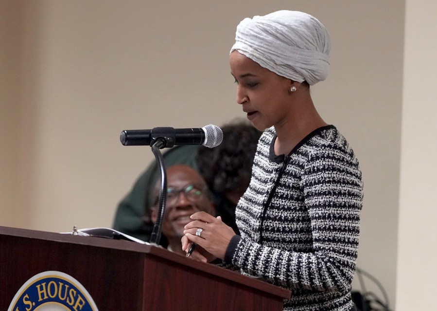 man-sprays-unknown-substance-on-rep.-ilhan-omar-and-is-tackled-at-minneapolis-town-hall