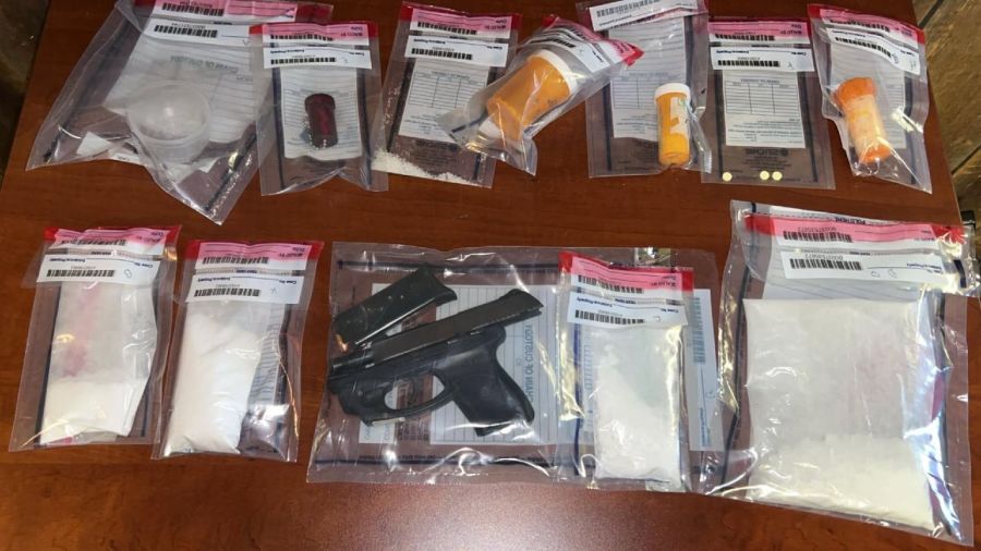 suspected-drugs,-gun-and-cash-uncovered-in-wellsville-search