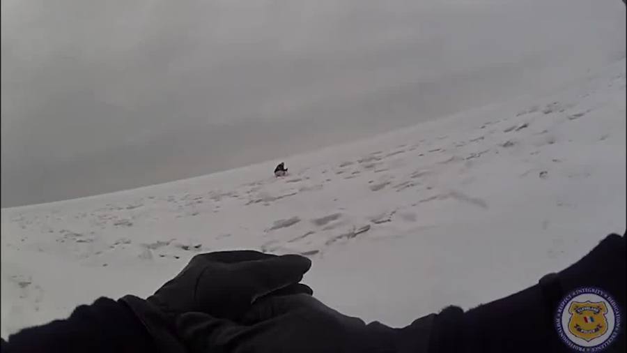 video:-cleveland-police-officers-rescue-woman-in-crisis-from-frozen-lake-erie