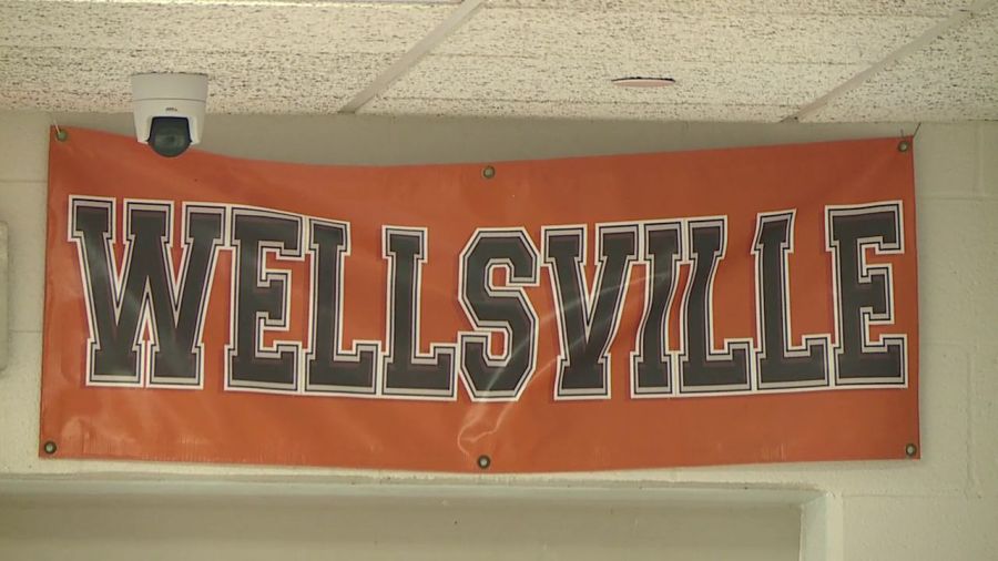 football-players-help-clean-up-after-wellsville-building-collapse