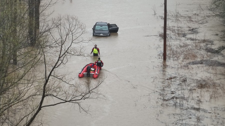 photos:-2-rescued-from-submerged-car-on-flooded-huron-county-roadway
