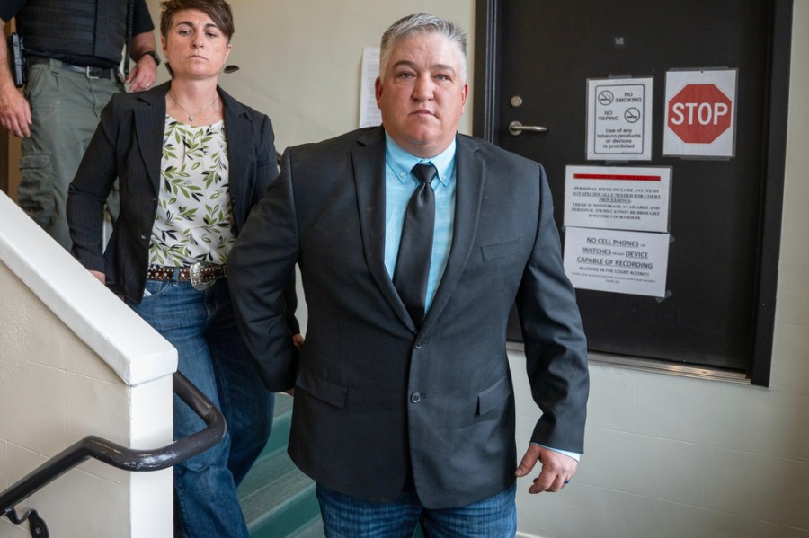 wyoming-man-sentenced-after-bringing-injured-wolf-to-bar,-taking-photos-as-it-died