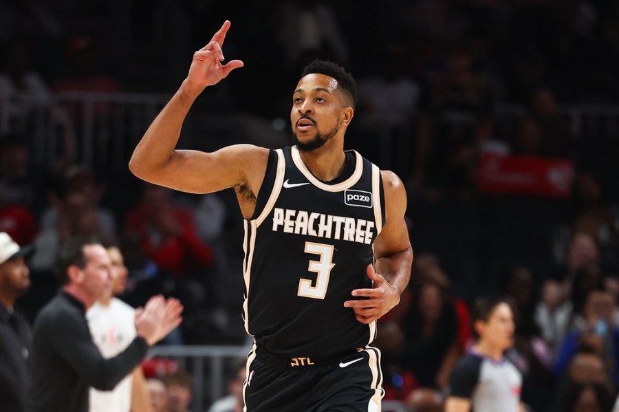 hawks-clinch-a-playoff-spot-in-rout-of-cavs