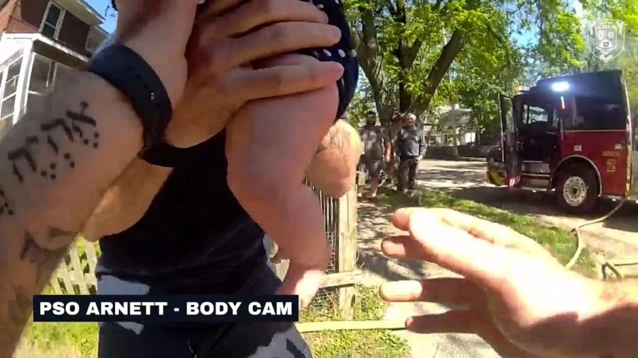 ‘throw-me-your-kid!’-officer-catches-baby-during-escape-from-michigan-house-fire