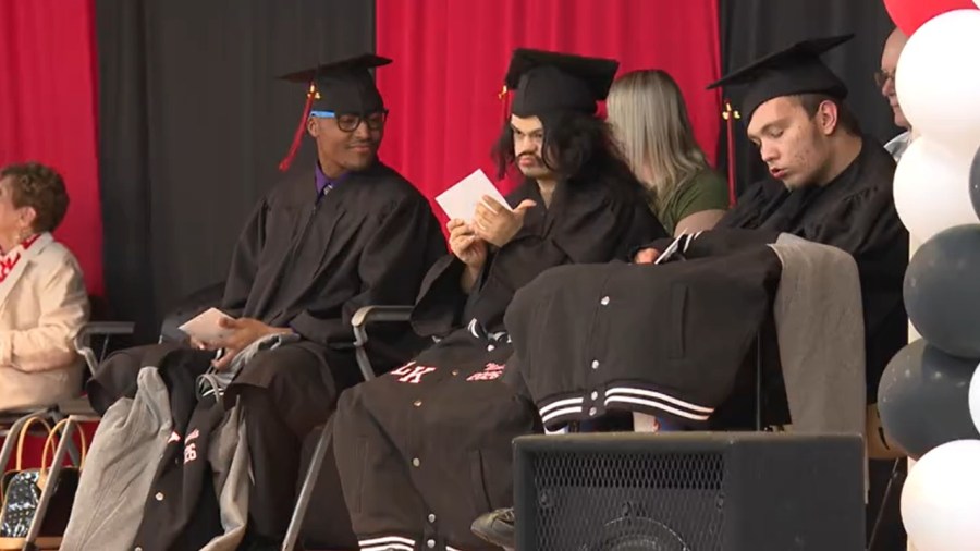 students-cheered-on-as-they-receive-diplomas-at-leonard-kirtz-school