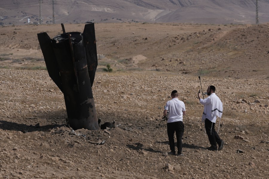israel-and-iran-trade-strikes,-threatening-to-drag-region-back-to-full-scale-war