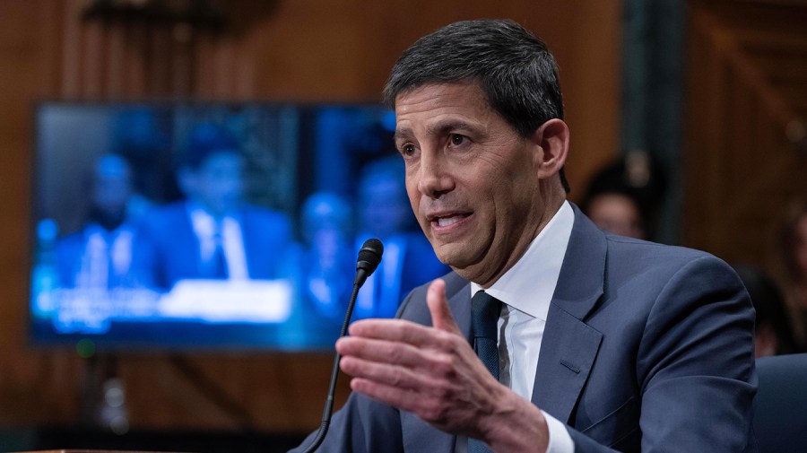 federal-reserve-holds-rates-steady-at-warsh’s-first-meeting