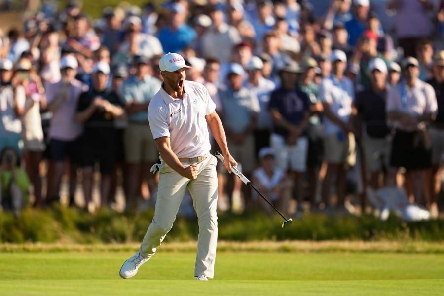 clark-avoids-record-collapse-to-win-the-us-open