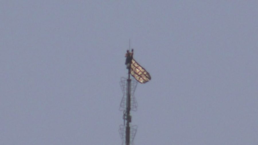people-fly-banner-from-atop-empire-state-building-spire,-appear-to-get-engaged