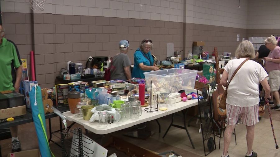 people-line-up-outside-local-church-for-rummage-sale-deals