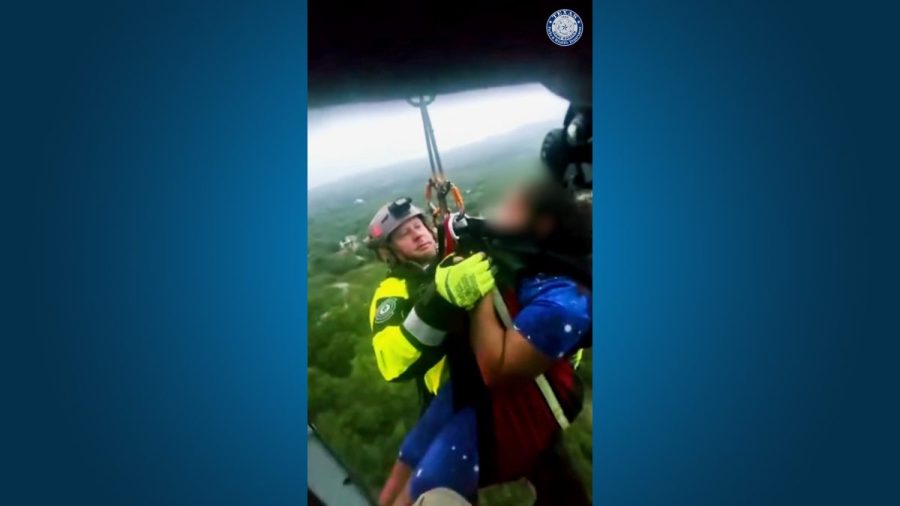 watch:-helicopter-rescues-kids-from-texas-floodwaters
