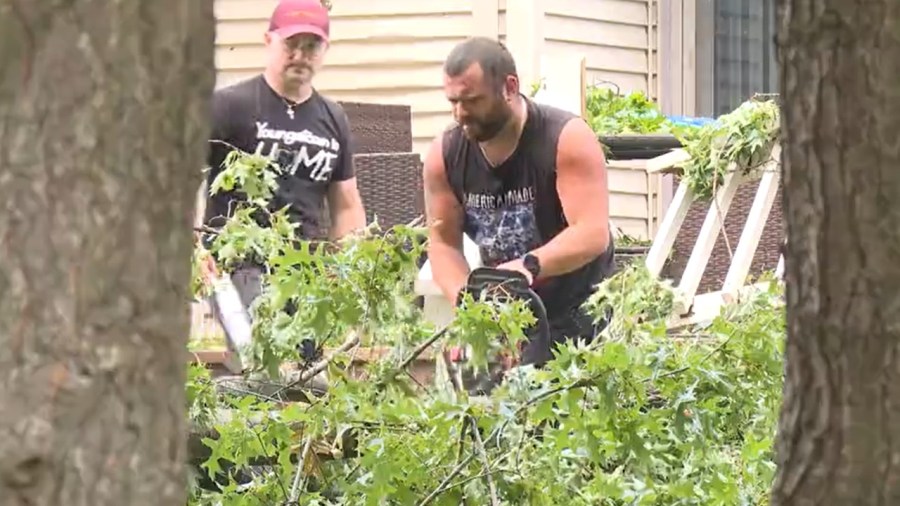 poland-residents-cleaning-up-after-storm-sweeps-through-area
