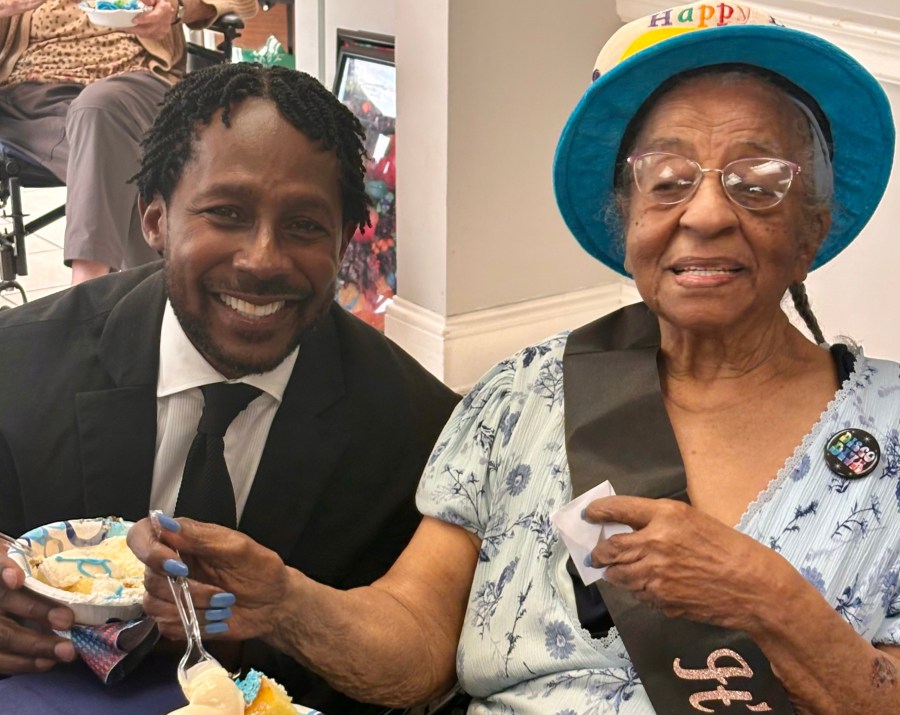 local-heisman-winner-celebrates-with-102-year-old-woman