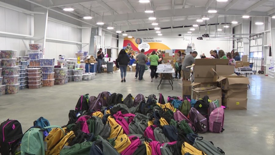 volunteers-to-pack-2,000-bookbags-for-local-students