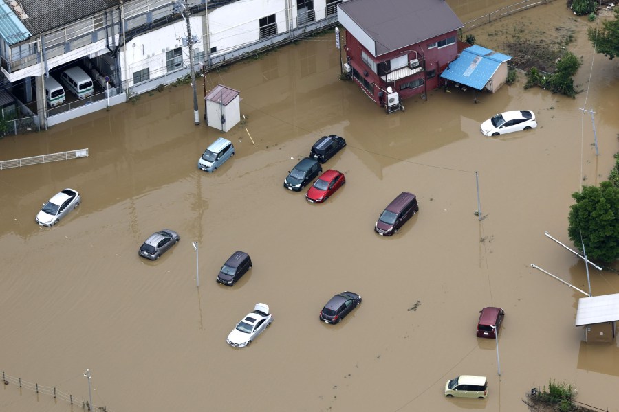 heavy-rain-causes-flooding-near-tokyo-that-kills-4-and-strands-travelers