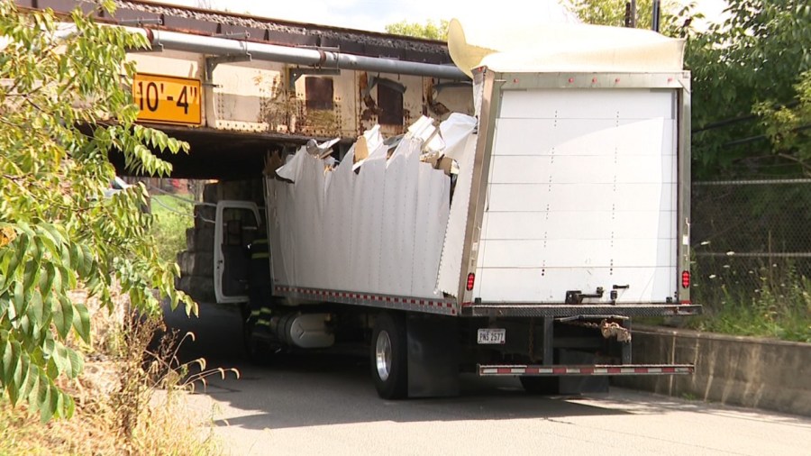 low-rail-bridge-shaves-off-top-of-truck