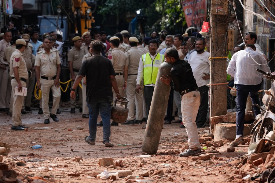 rescuers-look-for-survivors-after-new-delhi-hostel-collapse-kills-7