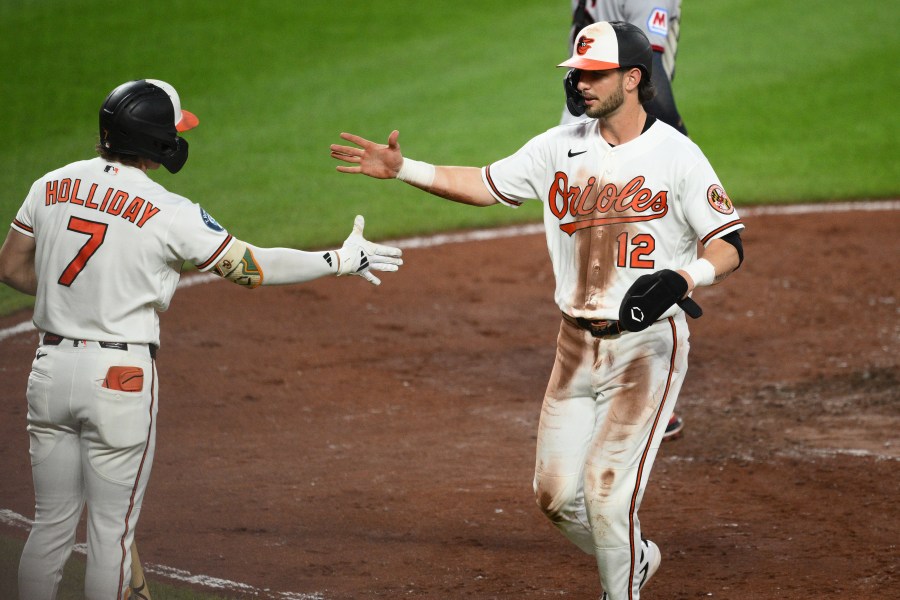 8-run-inning-lifts-orioles-past-guardians-9-5
