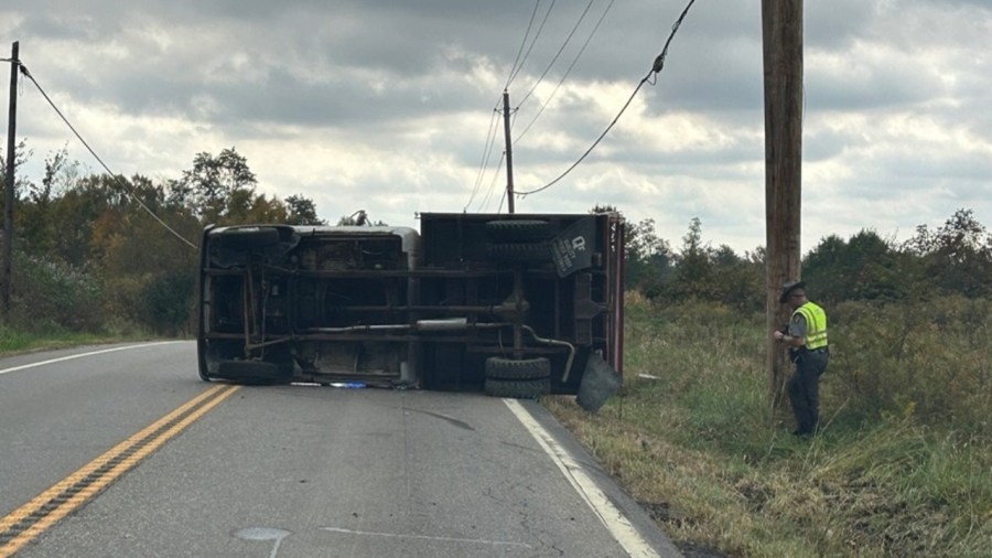 work-truck-overturns,-disrupts-traffic