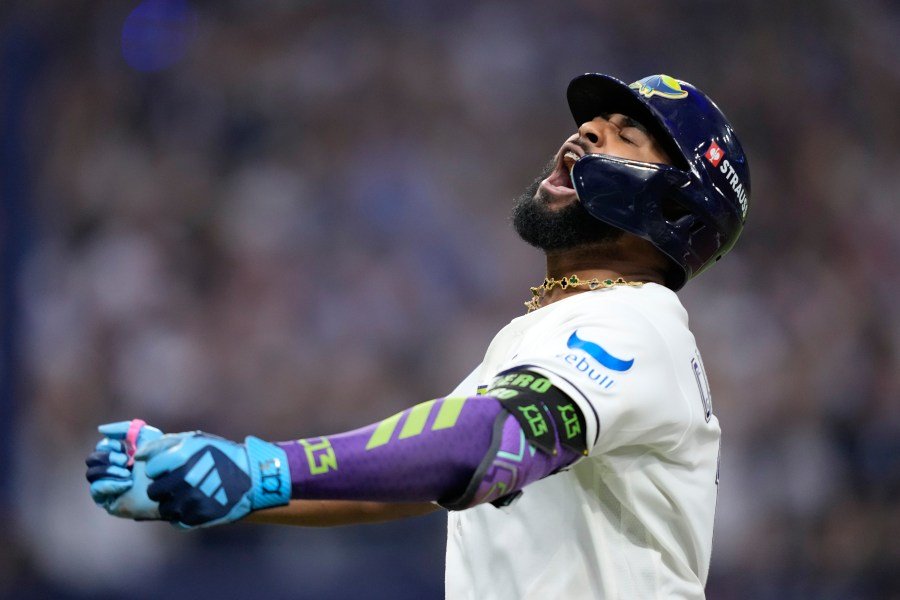 rays-top-guardians-7-3,-advance-to-the-world-series